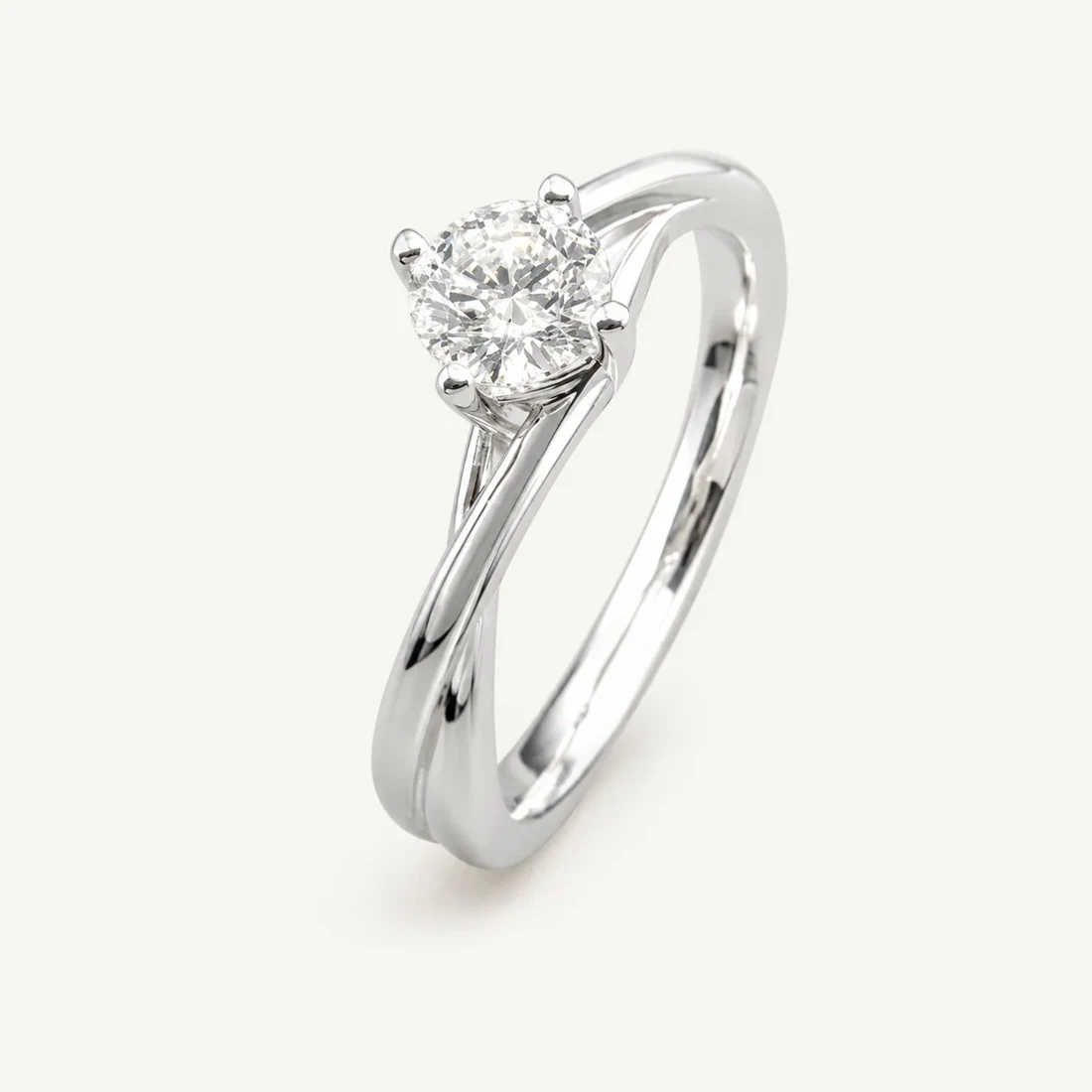 Four-claw solitaire in white gold